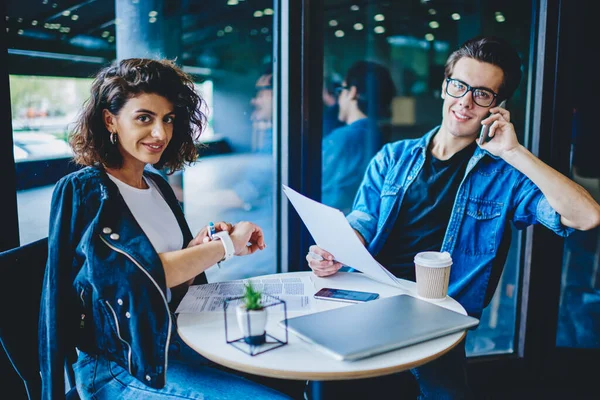 Portrait Pretty Young Woman Managing Time Smartphone While Positive Young — Stok Foto