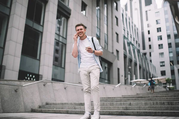 Cool Young Man Holding Cup Coffee Speaking Mobile Phone Happily — Stock Photo, Image