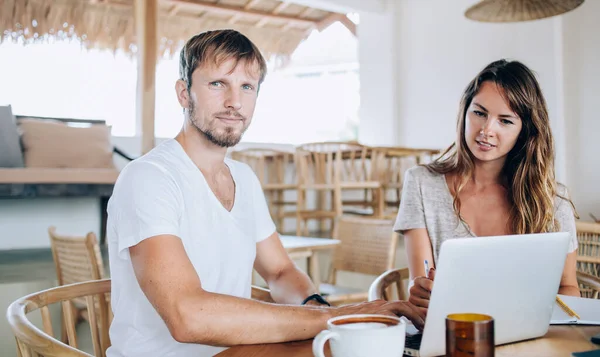 Attractive Young Workers Sitting Table Comfy Cafe Working Laptop Together — Stock Photo, Image