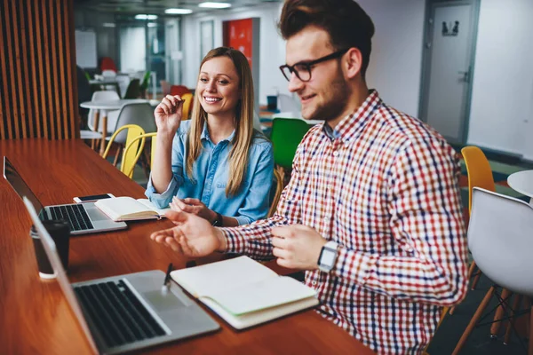 Happy Professionals Discuss Product Promotion Sitting Laptops Cheerful Skilled Experts — Stock Photo, Image