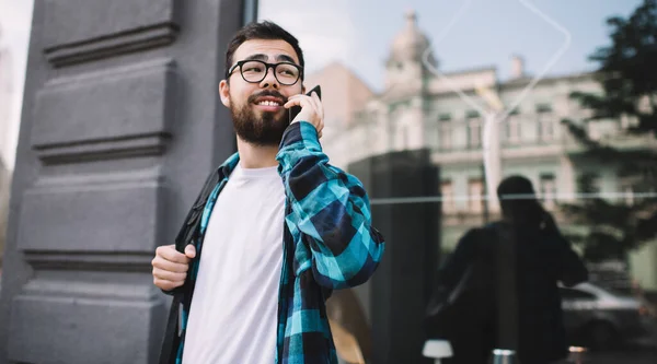 Smiling Bearded Asian Young Man Looking Away While Having Roaming — Stock Photo, Image