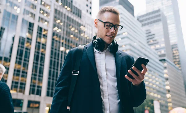 Cheerful Formal Handsome Young Man Glasses Wearing Suit Using Wireless — Stock Photo, Image