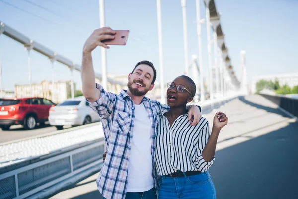 Smiling Excited Bearded Guy Calling Friend Video Chat Hugging African — Stock Photo, Image