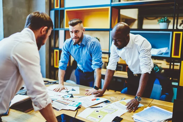 Multiracial Modern Serious Male Colleagues Elegant Shirts Working Table Loaded — Stock Photo, Image