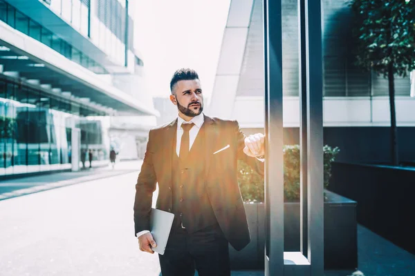 Smart Bearded Boss Tablet Looking Away Contemplating While Standing Metal — Stock Photo, Image