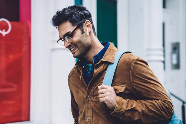 Cheerful Smiling Handsome Ethnic Casual Adult Man Glasses Plugged Earbuds — Stock Photo, Image