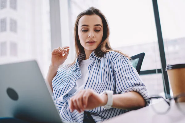 Contemporary Female Executive Casual Wear Checking Time While Working Laptop — Stock Photo, Image