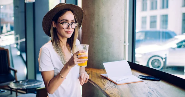 Pensive Adult Modern Female Casual Outfit Glasses Wearing Hat Sitting — Stock Photo, Image