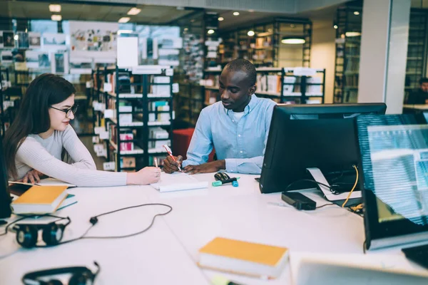 Concentrated Content Multiracial Students Comfy Wear Writing Report While Sitting — Stock Photo, Image