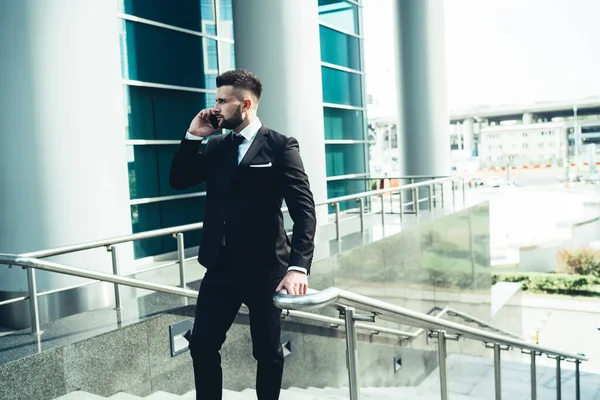 Boss Dark Suit Having Smartphone Conversation Looking Away While Standing — Stock Photo, Image