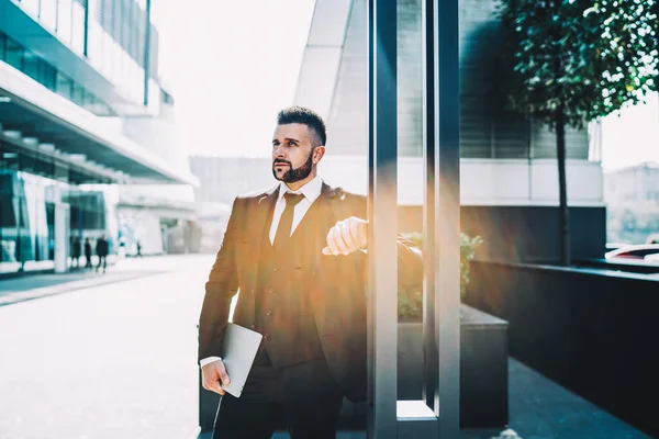 Smart Bearded Manager Tablet Looking Away Thinking While Leaning Pillar — Stock Photo, Image