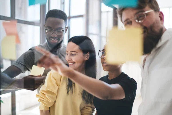 Joyful Group Multiethnic Coworkers Smart Casual Standing Glass Wall Looking — Stock Photo, Image