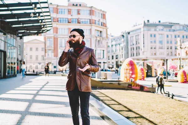 Stylish Bearded Man Casual Outfit Gesticulating Answering Phone Call While — Stock Photo, Image