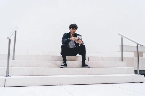 Young Cheerful African American Male Student Wearing Black Clothes Sitting — Stock Photo, Image