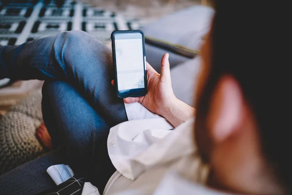 Faceless Male Casual White Shirt Jeans Browsing Mobile Phone Sitting — Stock Photo, Image