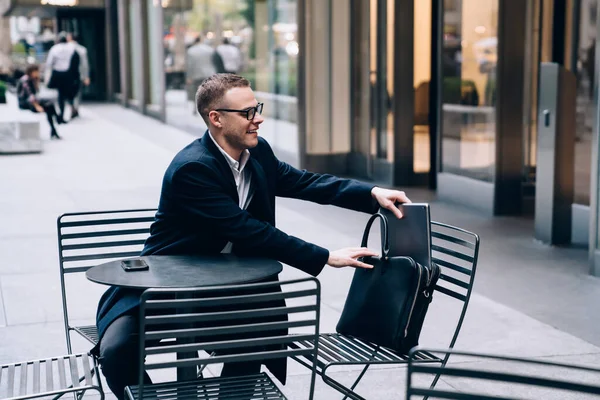 Successful Cheerful Businessman Sitting Front Table Street Cafe Putting Laptop — Stock Photo, Image