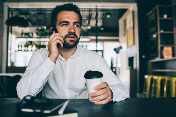 Pensive Caucasian Bearded Hipster Guy Talking Mobile Phone Coffee Break — Stock Photo, Image