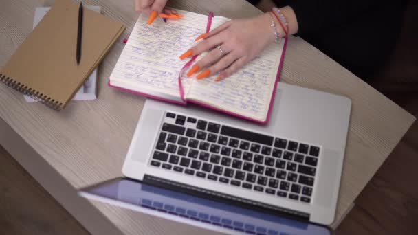 Girl making notes, online studying, self education lerning languages by internet — Stock Video