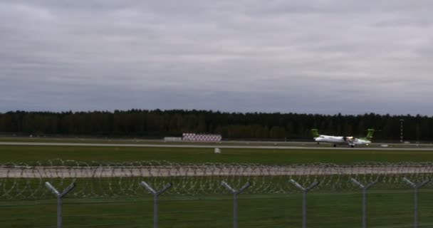 RIGA LATVIA - OCTOBER 8: Airbaltic plane takeoff from airport in Riga, October 8, 2016 in Riga — Stock Video