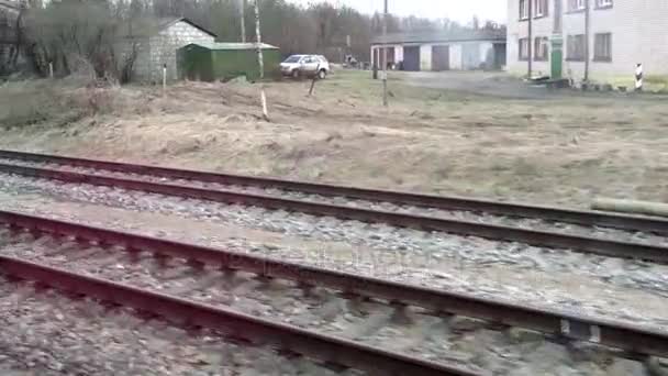 View of passing landscape from a train window — Stock Video