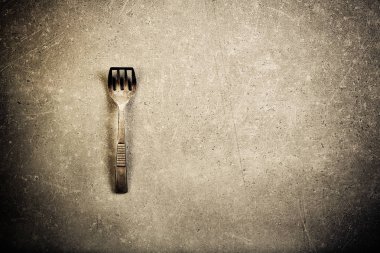 Vintage çay kaşığı grunge üzerinde 