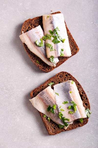 Brown bread and fish - — Stock Photo, Image