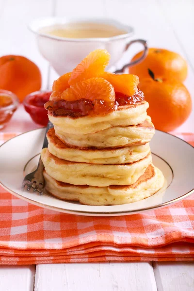 Pancakes with tangerine topping, — Stock Photo, Image