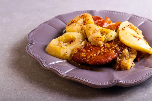 Mustard pork chops with apple