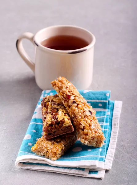 Muesli bars over napkin — Stock Photo, Image