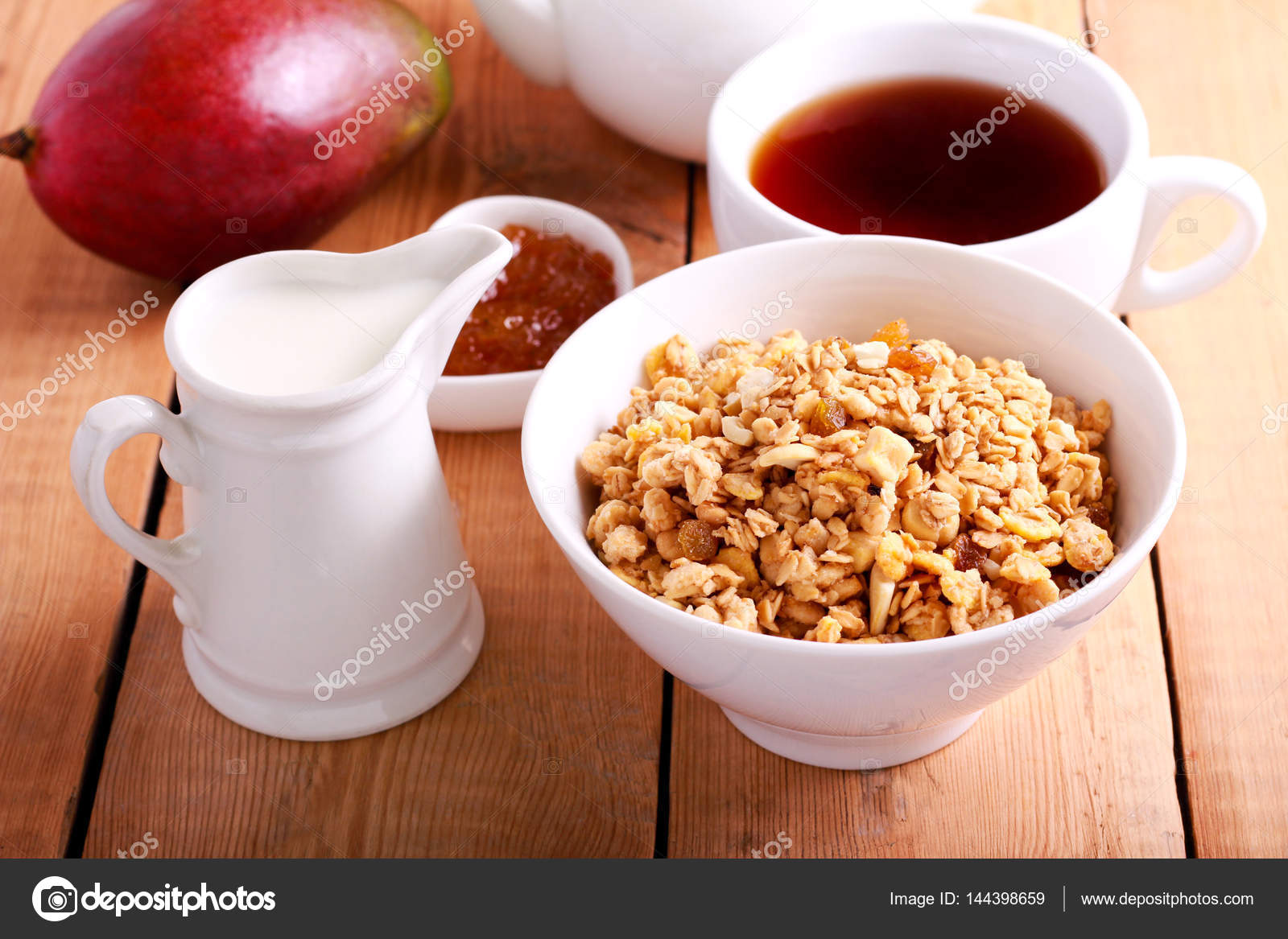 Muesli with fruit and nuts Stock Photo by ©manyakotic 144398659