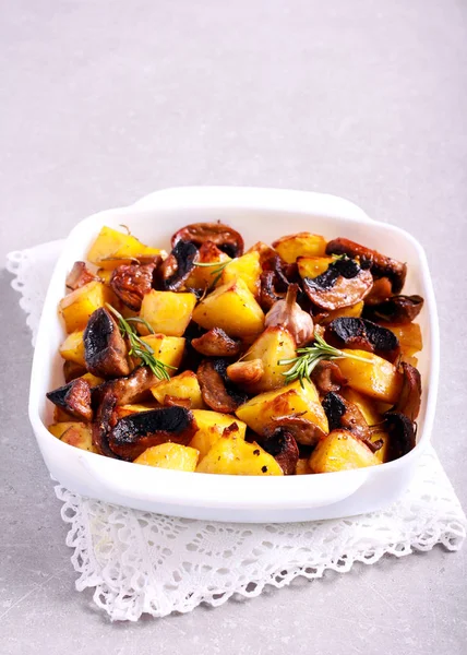 Roast potatoes with mushrooms — Stock Photo, Image