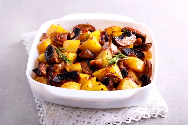 Roast potatoes with mushrooms — Stock Photo, Image