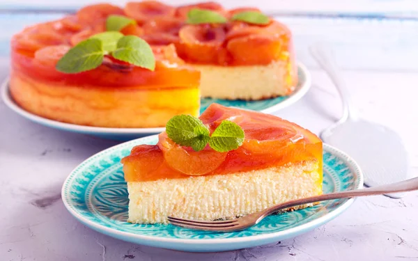 Apricot jelly topping cheesecake — Stock Photo, Image