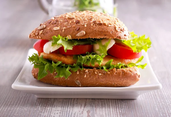 Chicken fillet, tomato and mozzarella sandwich — Stock Photo, Image