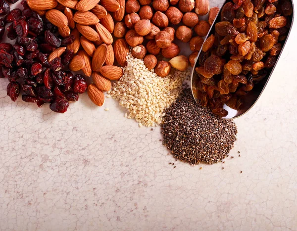 Nuts, seeds, cranberry and raisin — Stock Photo, Image