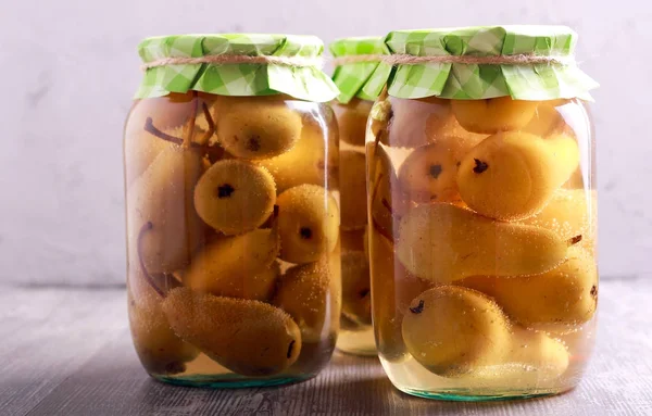 Spicy pear compote in jars — Stock Photo, Image