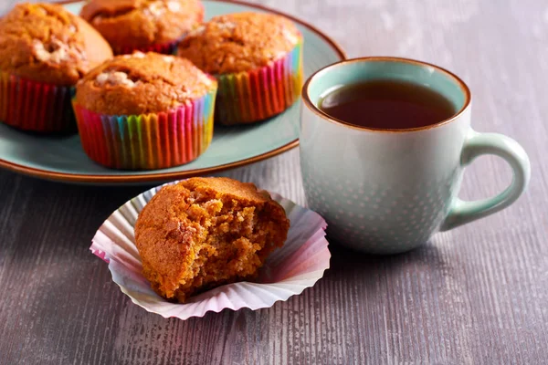 Pumpkin muffins and cup of tea — Stock Photo, Image