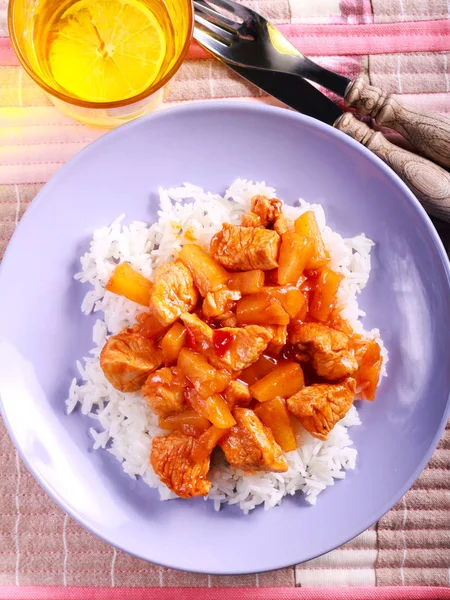Rice and turkey fillet with pineapple — Stock Photo, Image