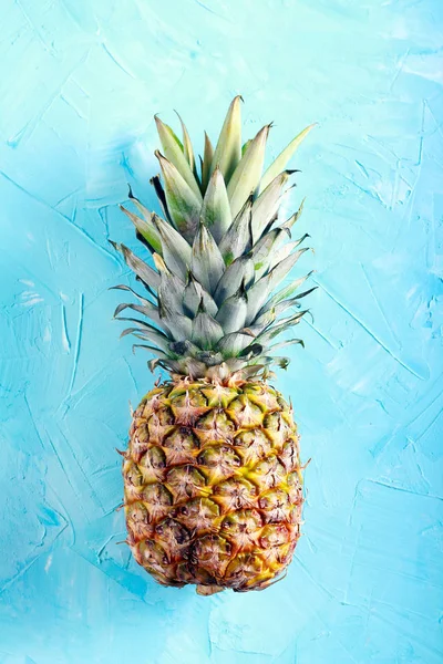 Pineapple fruit over blue background — Stock Photo, Image