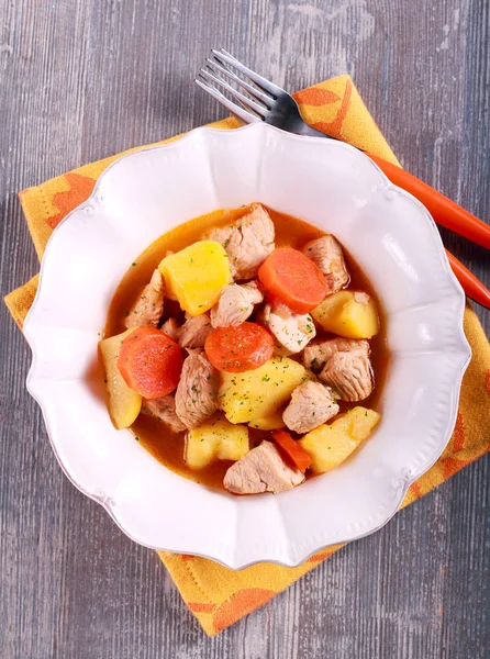 Turkey, potato and carrot stew in a plate — Stock Photo, Image