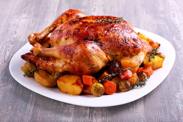 Roast chicken with brussel sprouts, carrot Royalty Free Stock Photos