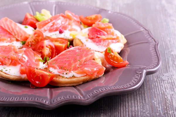 Buckwheat blinis with smoked trout — Stock Photo, Image