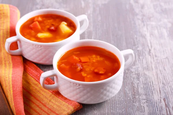 Sausage and red lentil soup, in bowls — Stock Photo, Image