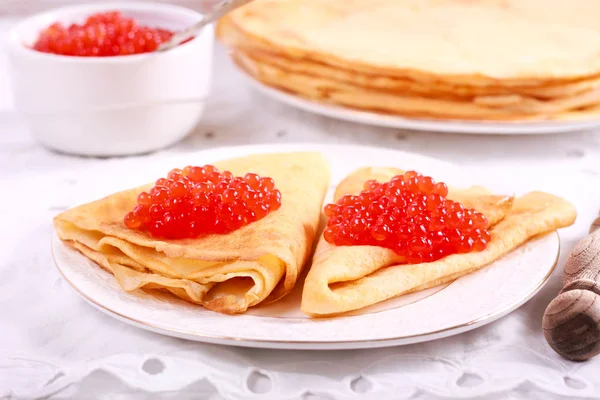 Thin pancakes with red caviar — Stock Photo, Image