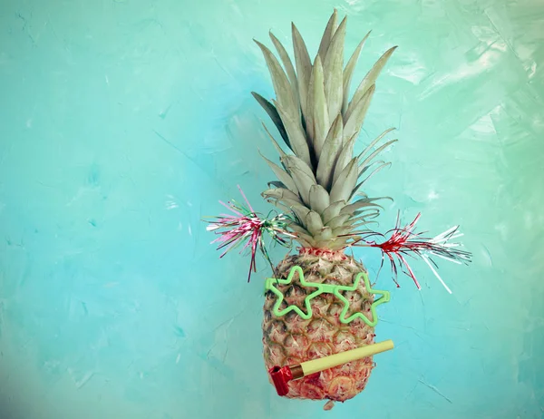 Party pineapple over blue background