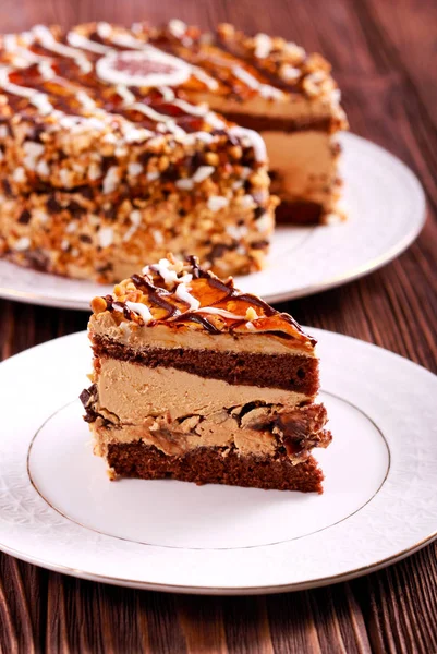 Caramel and nut layered cake, sliced — Stock Photo, Image