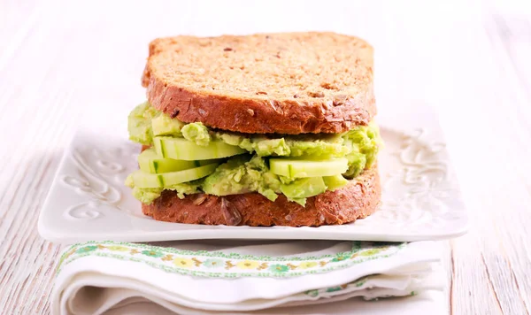 Avocado and cucumber sandwich — Stock Photo, Image