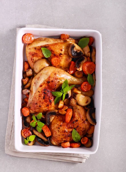 Chicken legs bake with mushrooms and carrot — Stock Photo, Image