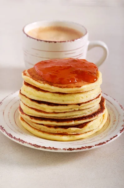 Pancakes with apricot jam served — Stock Photo, Image