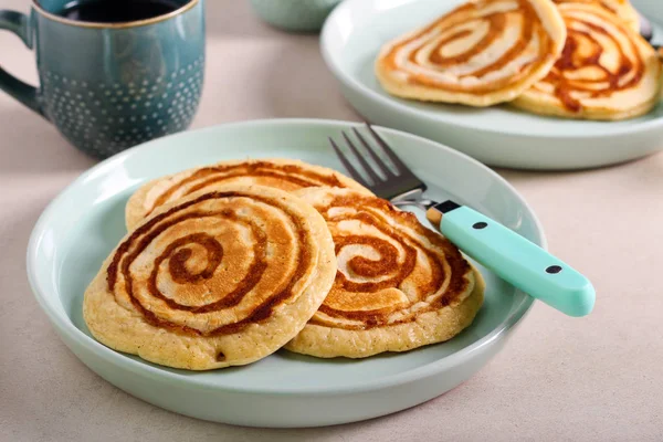 Cinnamon roll pancakes served — Stock Photo, Image